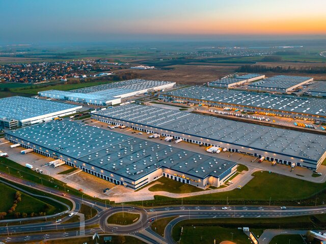 Aerial view of a huge logistics center in the evening